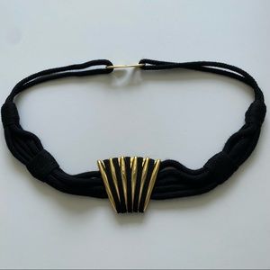 Vintage back and gold elastic belt size small/medium